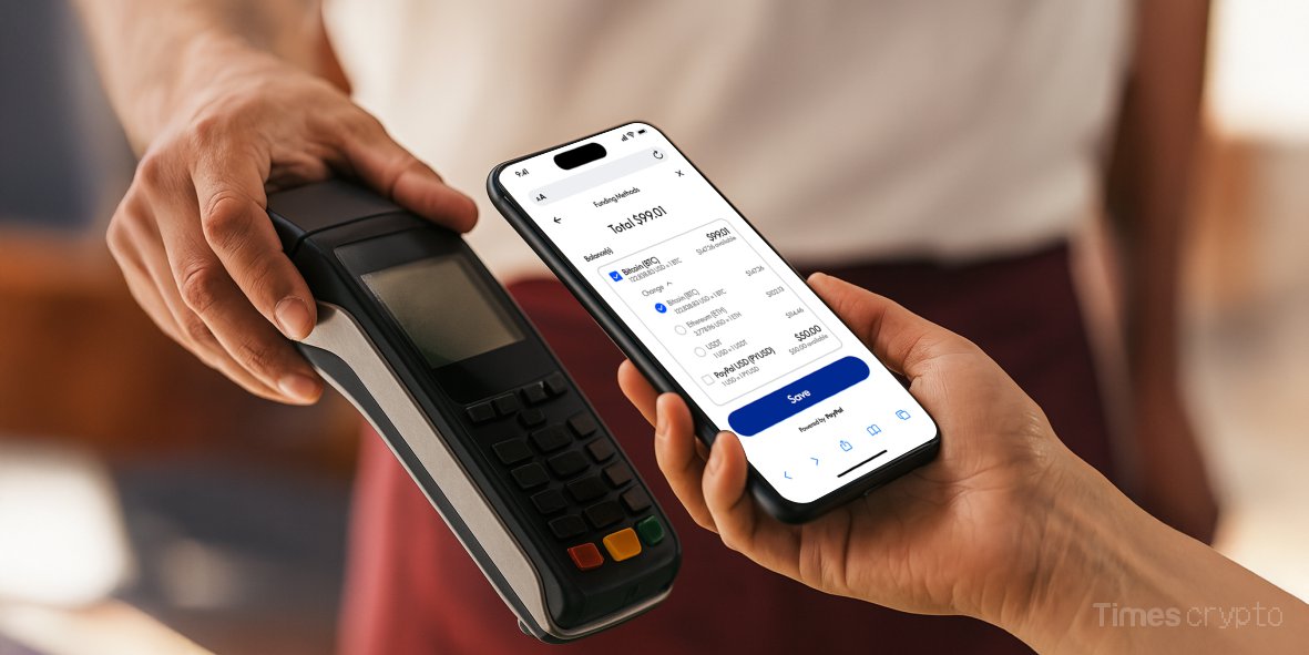 a person holding a phone and a machine. PayPal's “Pay with Crypto” Feature Goes Live: 100+ Tokens Now Accepted by U.S. Merchants