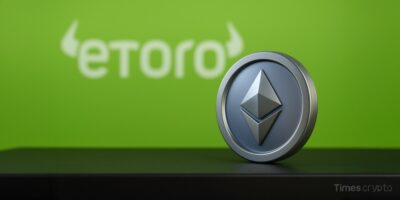 a silver coin with a symbol on it. eToro Enters Crypto: 100 U.S. Stocks to Be Tokenized on Ethereum