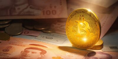 a bitcoin with a light shining on it and a baht bill in the background. Thailand Bets on Bitcoin: TouristDigiPay Lets Visitors Spend Crypto Like Cash