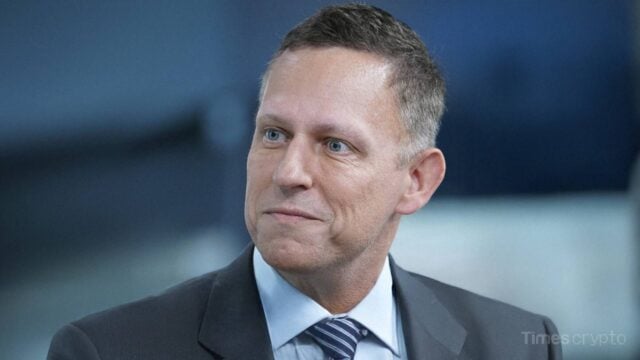 Peter Thiel in suit speaking on stage. Erebor Bank, Backed by Peter Thiel, Gets U.S. Nod as Crypto-Friendly Rival